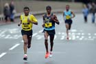 Haile Gebrselassie leads from Mo Farah in the BUPA Great North Run.